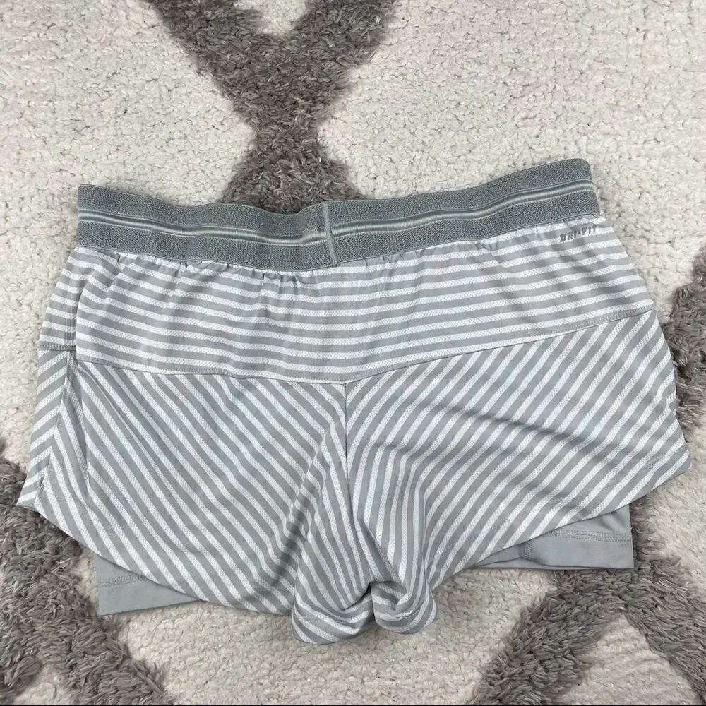 Nike small above